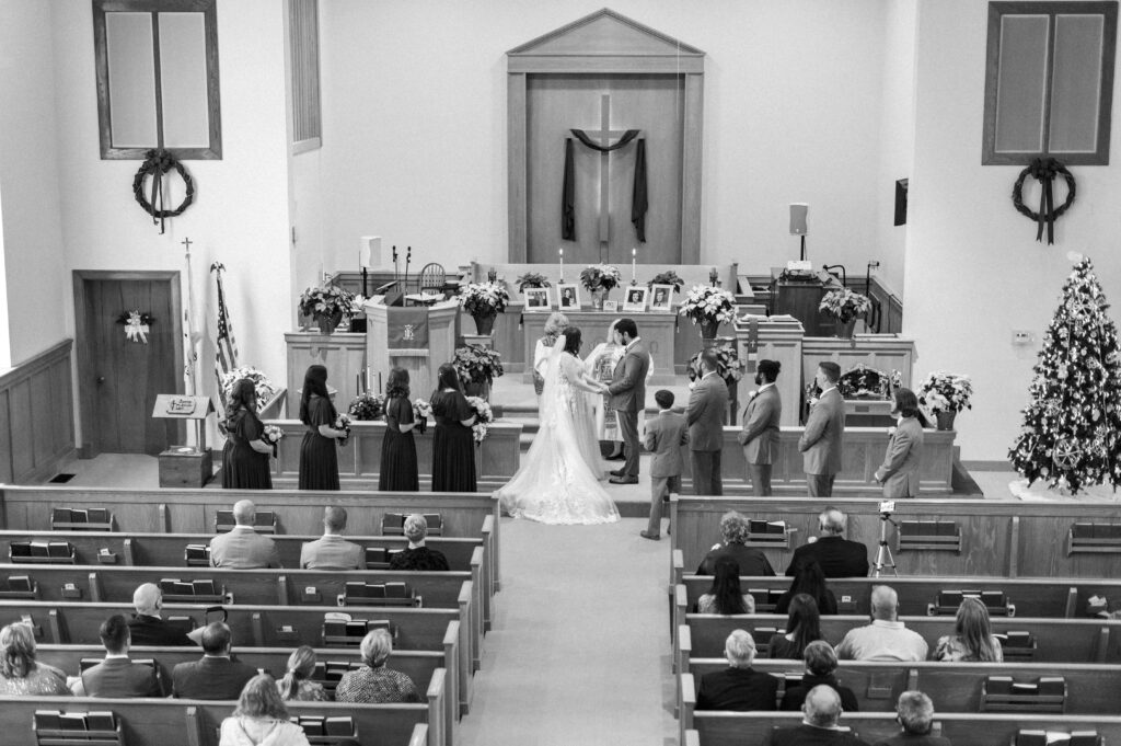 bride and groom exchanging vows