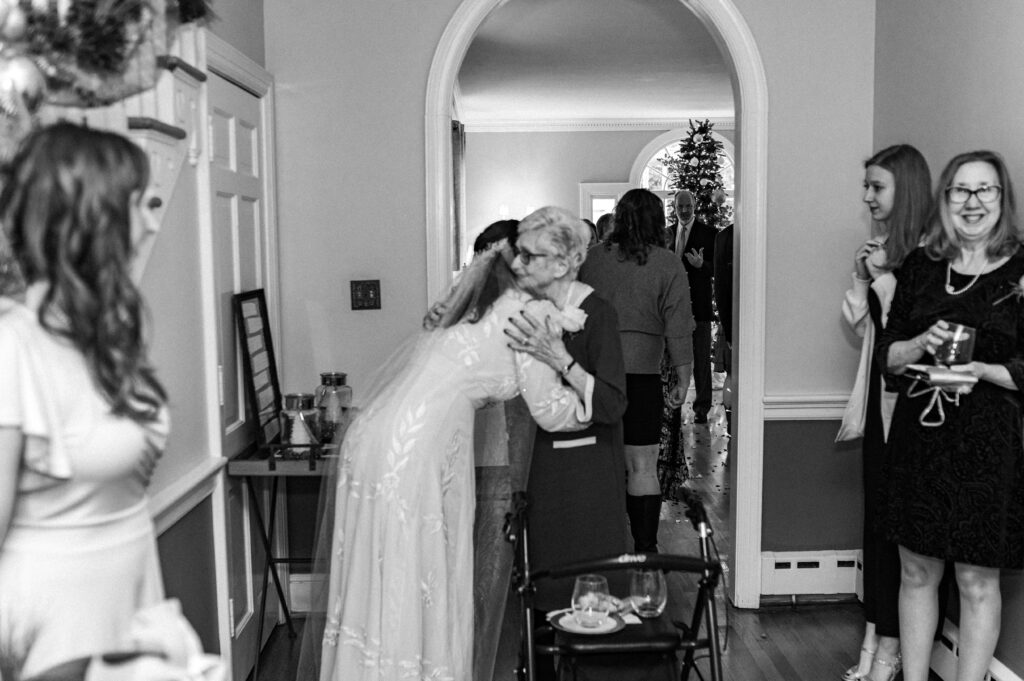 bride hugs grandmother