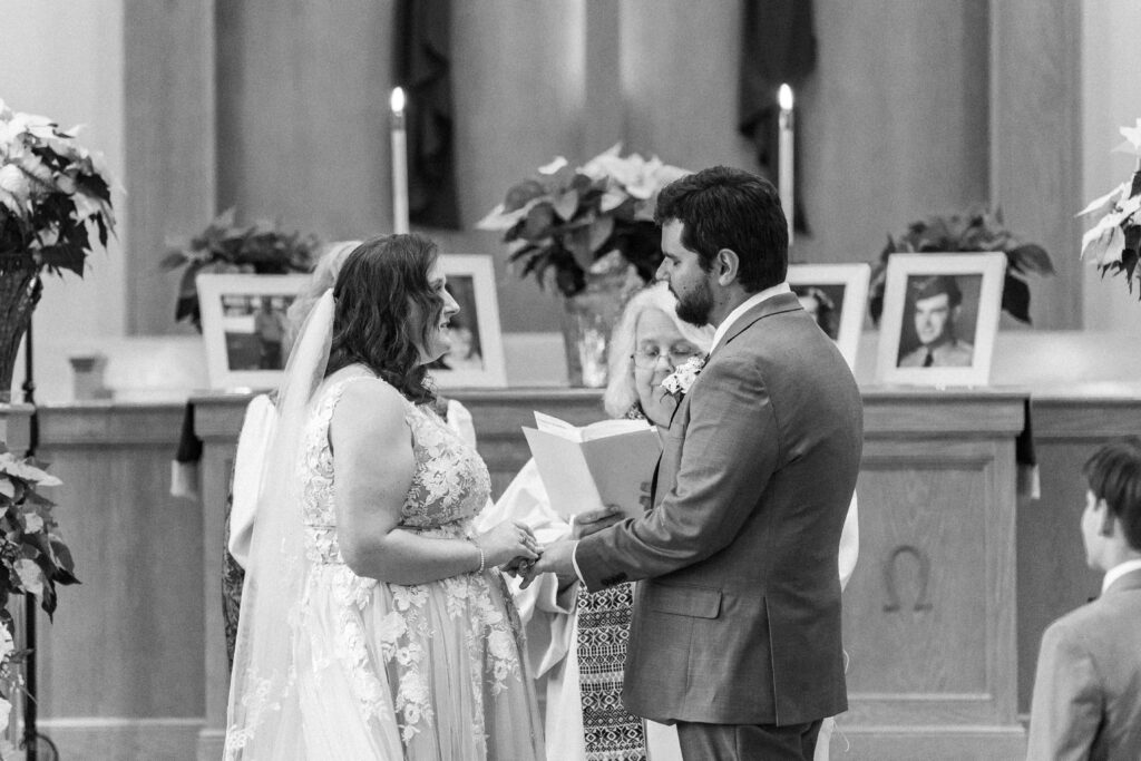 bride and groom exchanging vows