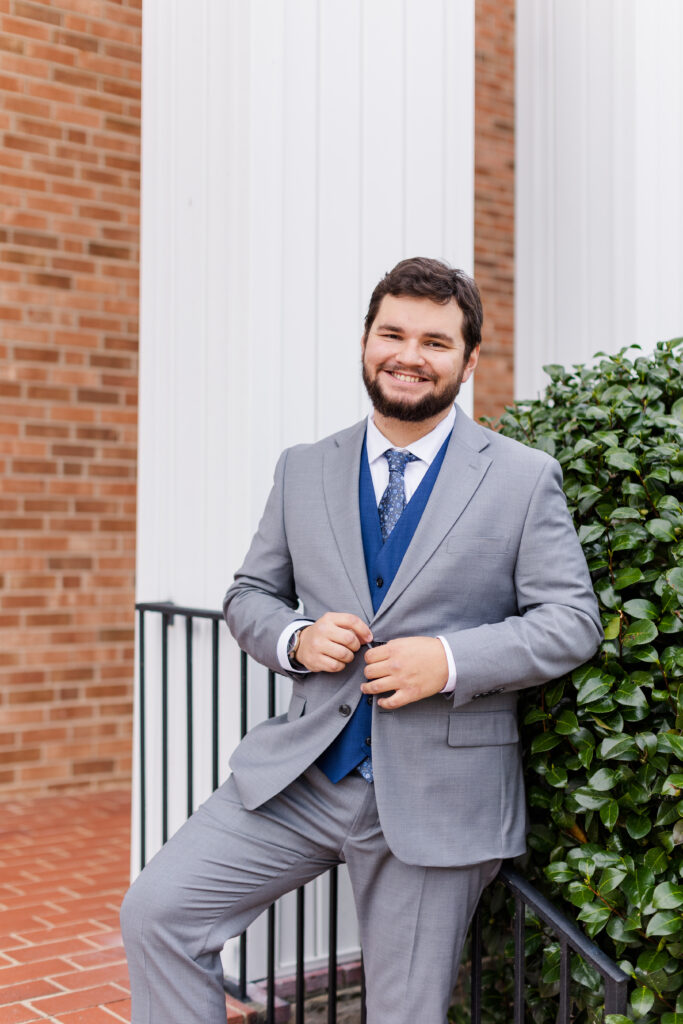 groom in gray suit