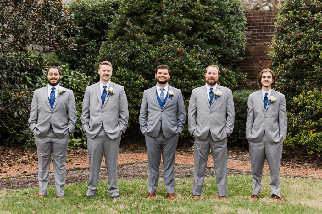 groomsmen in gray suits