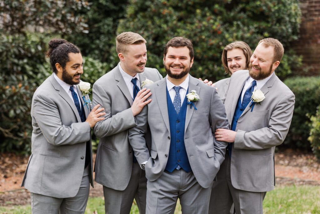 groomsmen in gray suits