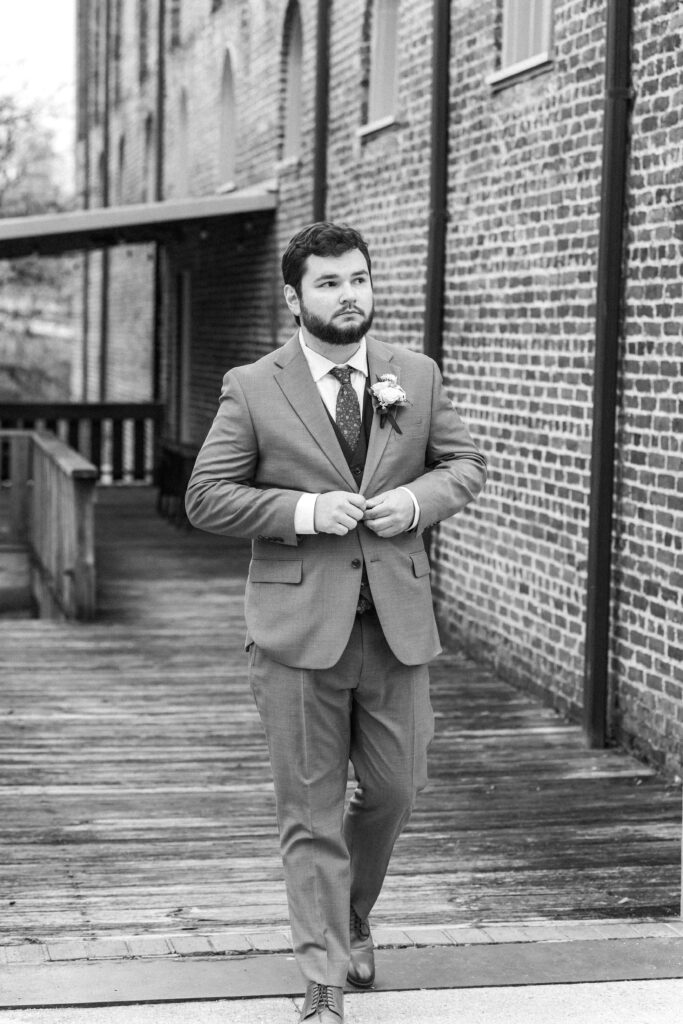 groom in gray suit