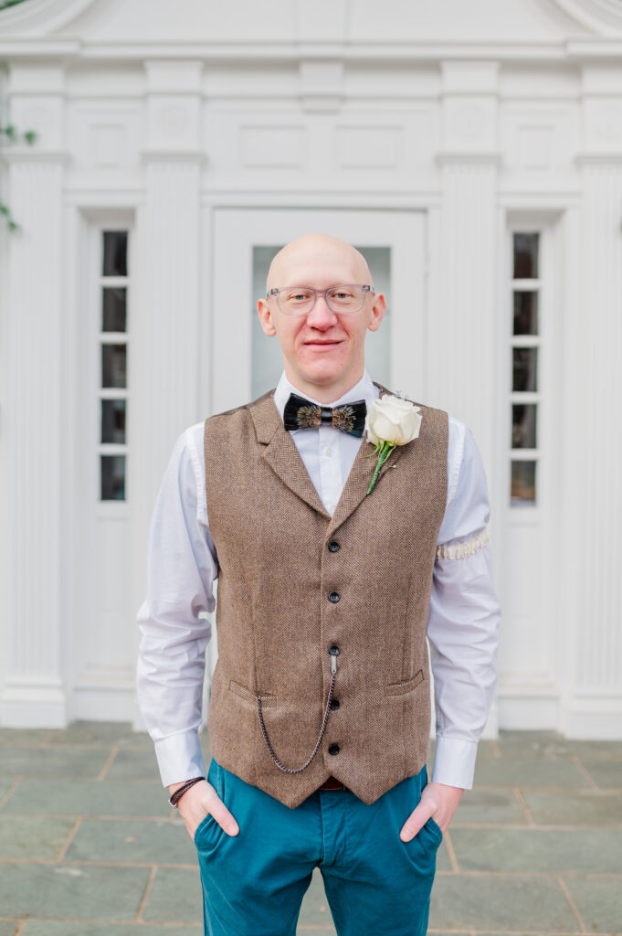 groom in front of oakdale inn in martinsville virginia