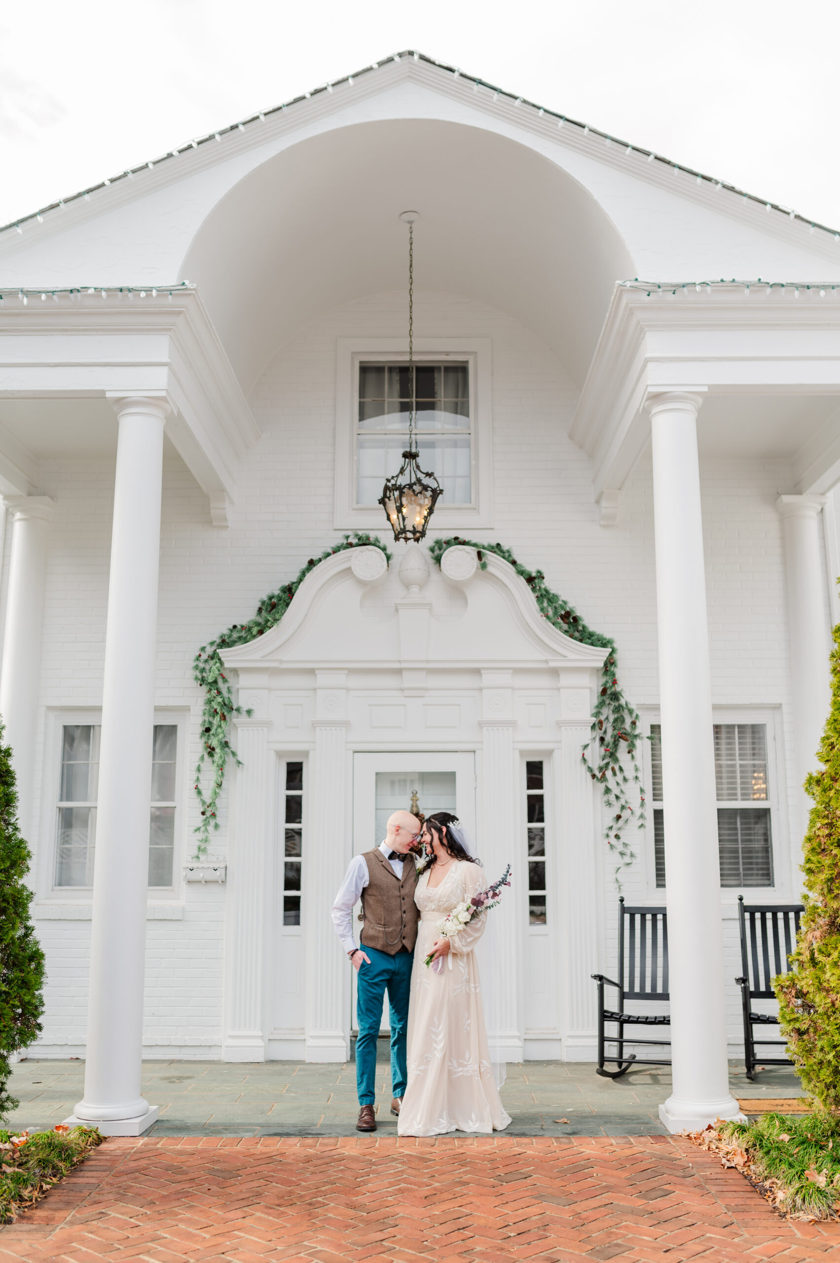 bride and groom in front of oakdale inn in martinsville virginia