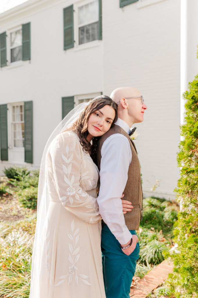 bride laying her head on groom's shoulder