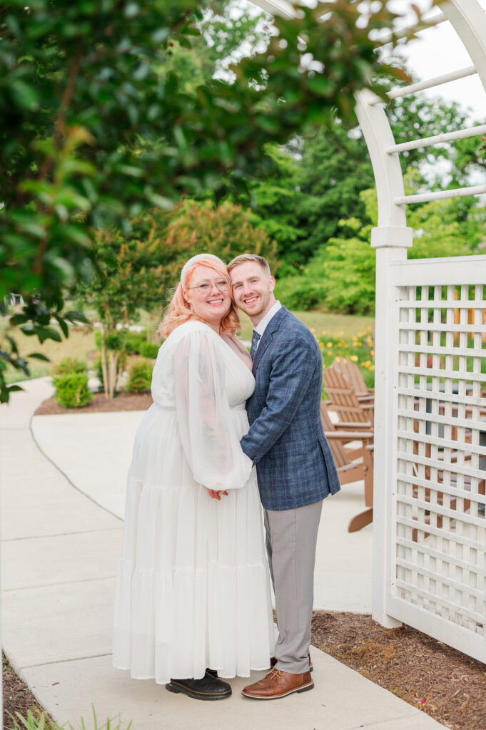 bride and groom smiling at camera