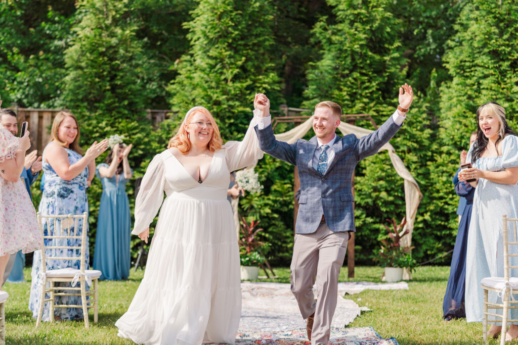 bride and groom walking back down aisle