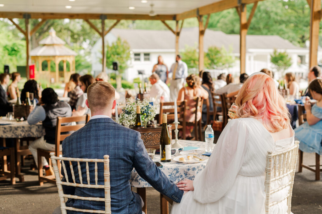 bride and groom during speeches