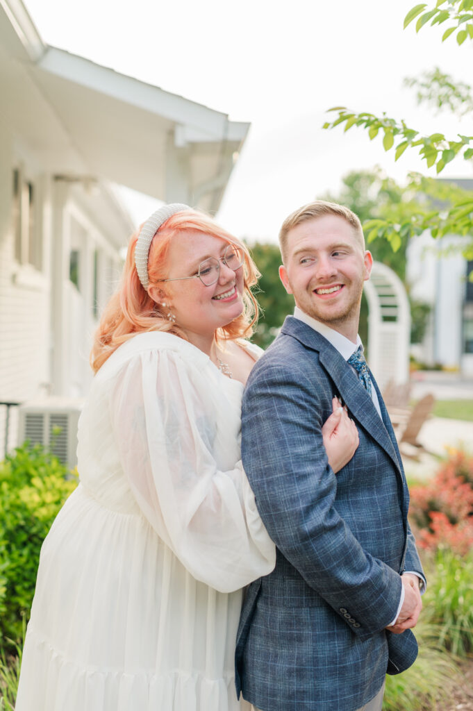 bride and groom smiling