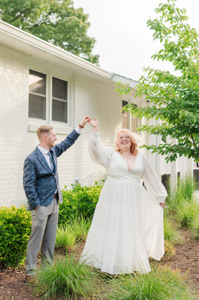 groom spinning bride