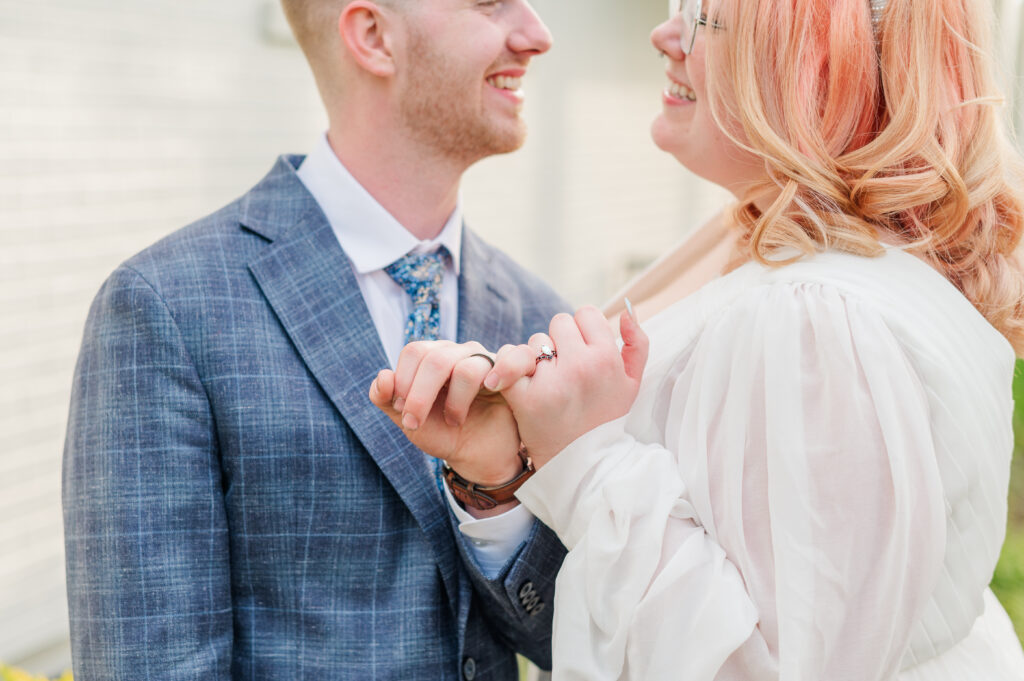 bride and groom pinky promise