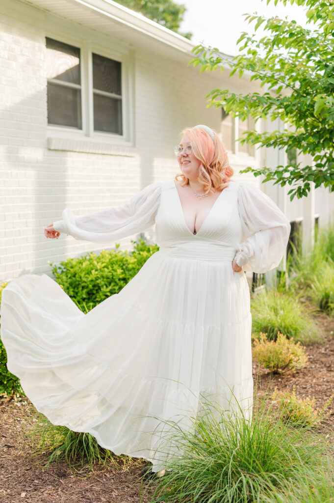 bride tossing dress