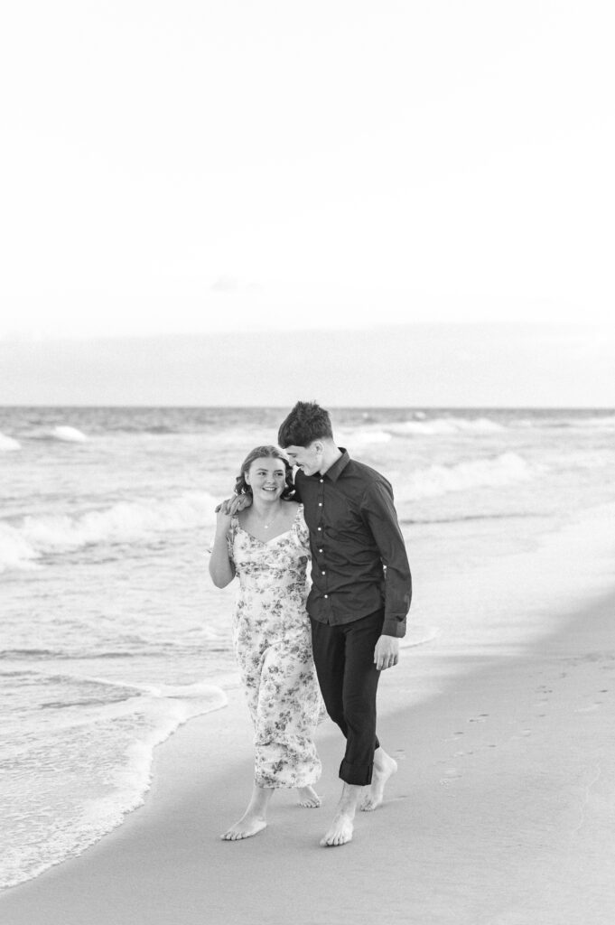 couple walking at topsail beach