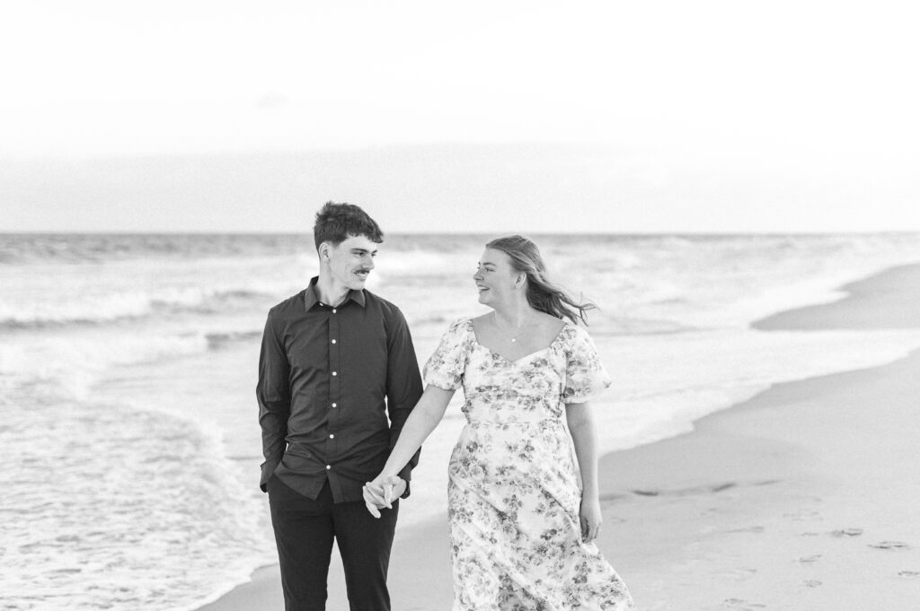 couple walking at topsail beach