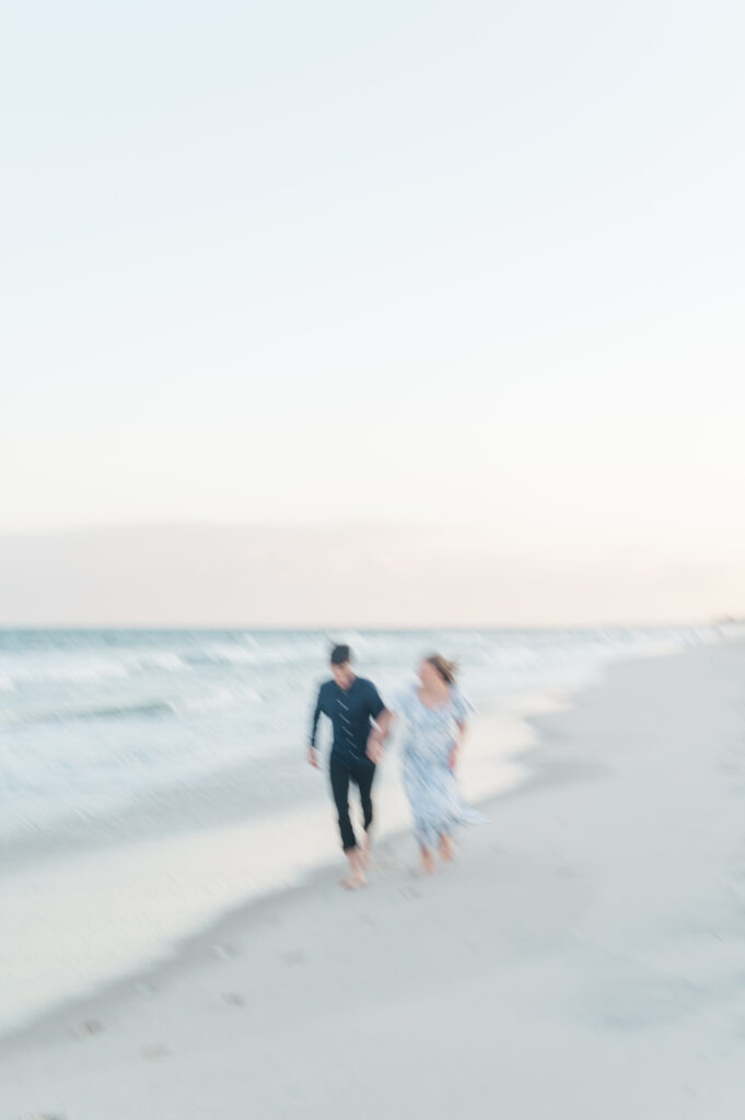 couple running at topsail beach