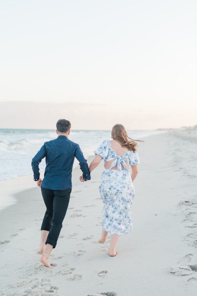 couple running at topsail beach