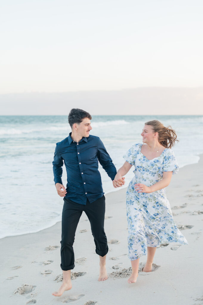 couple running at topsail beach