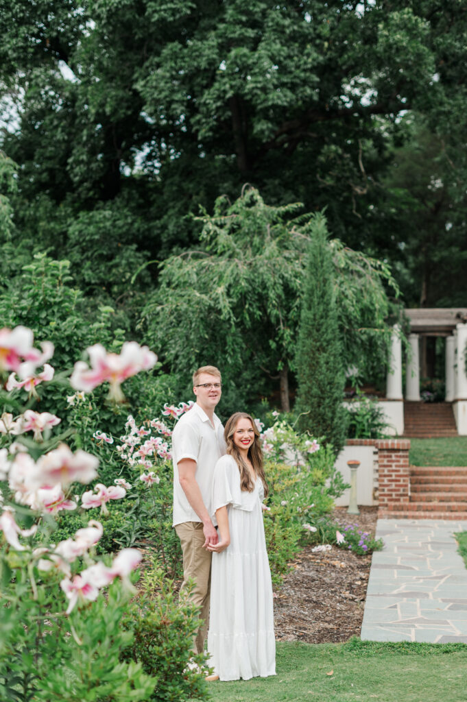 couple walking in reynolda gardens