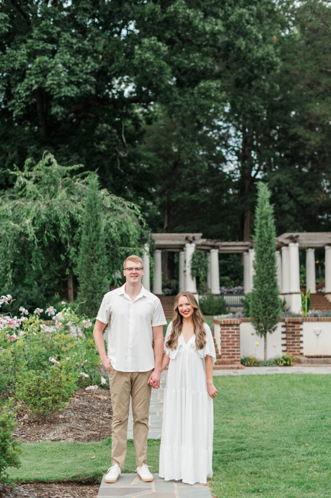 couple walking in reynolda gardens