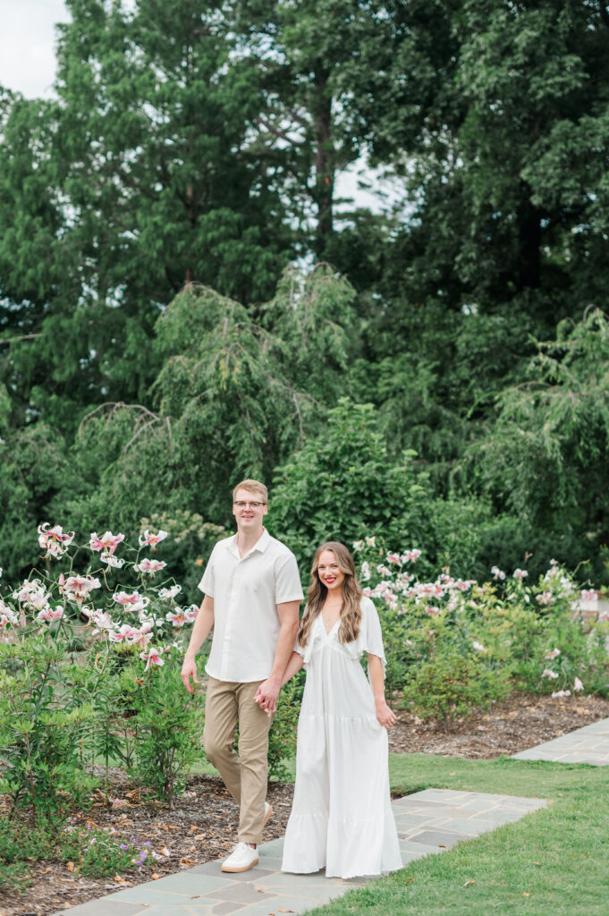 couple walking in reynolda gardens