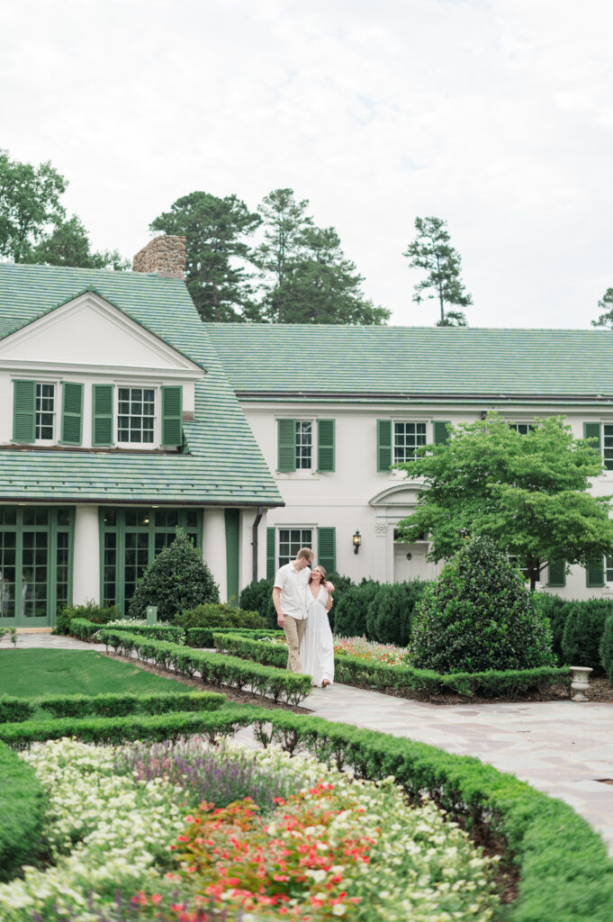 walking in reynolda garden engagement session