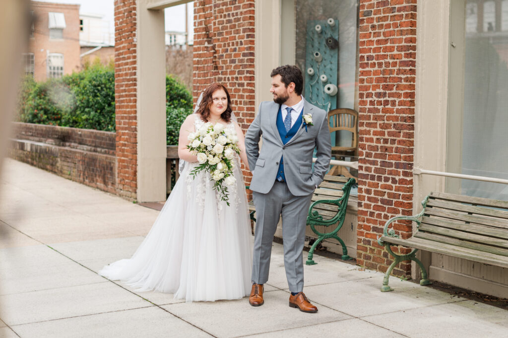 bride and groom walking downtown winston salem