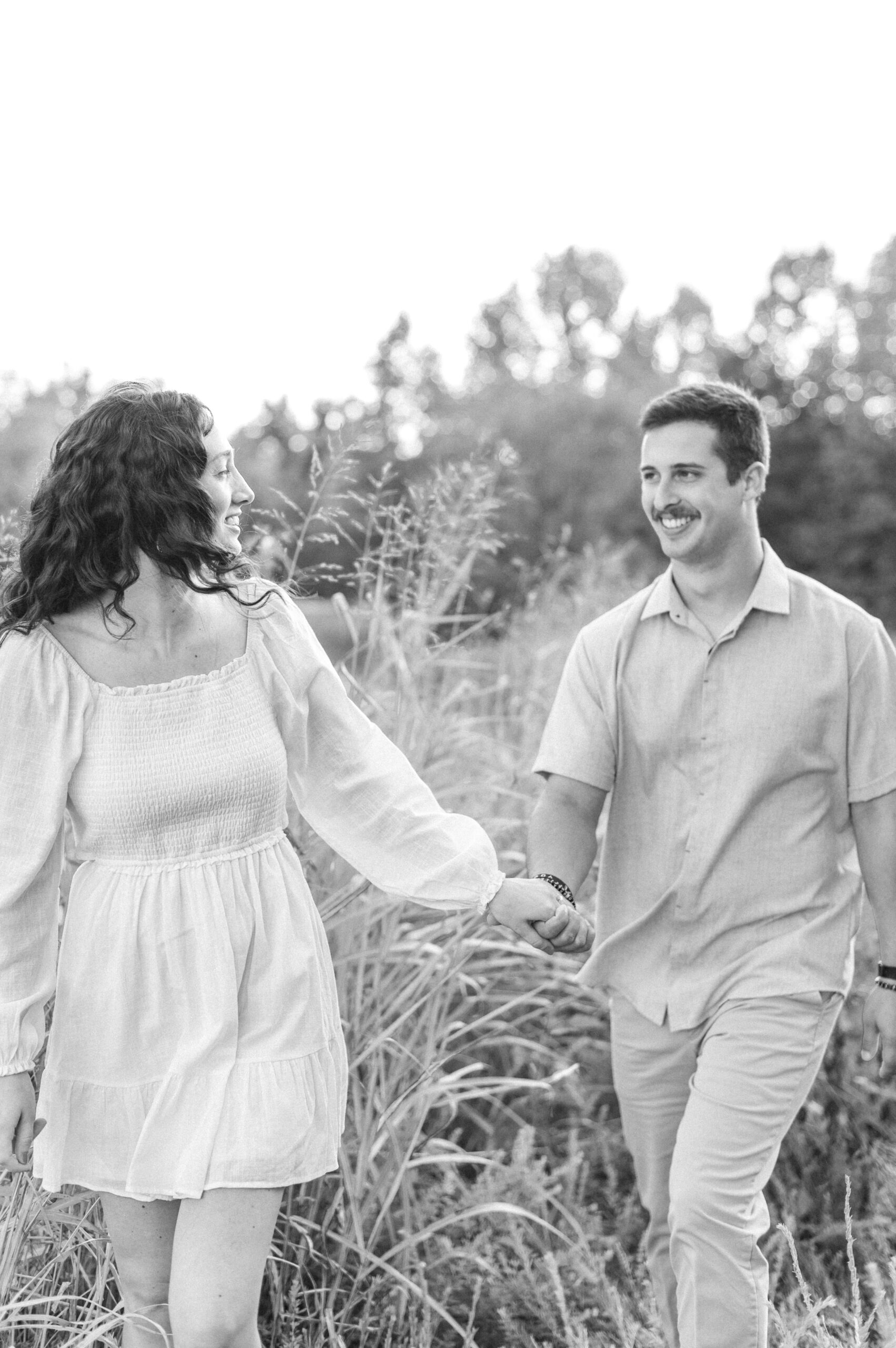 engaged couple walking