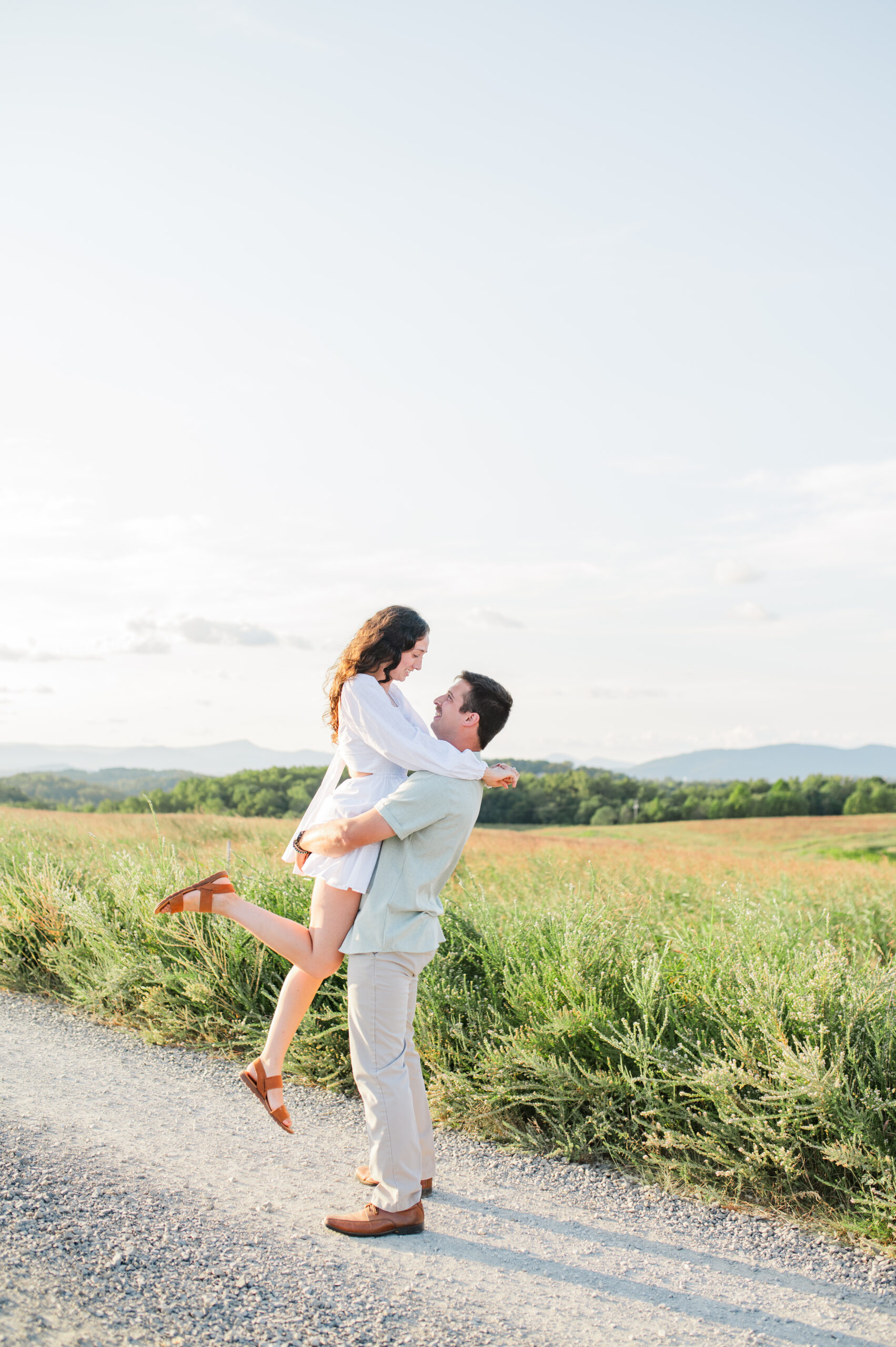 engagement photo lift pose