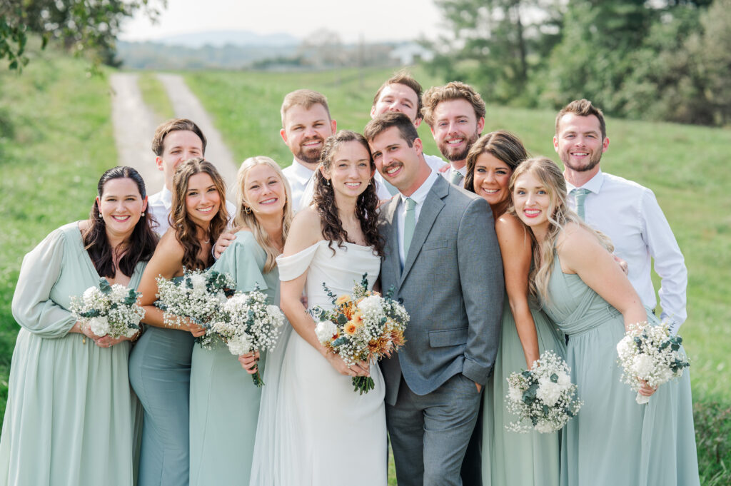 Bridal party group hug