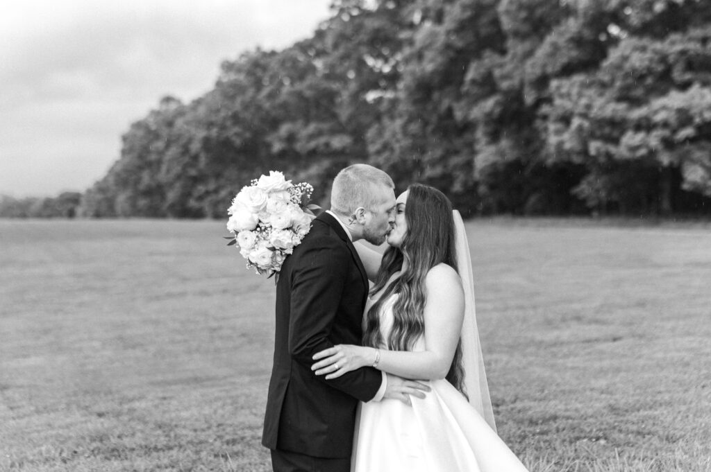 Summerfield farms bride and groom portraits kissing