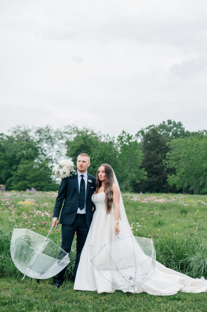 Bride and groom portraits flower field