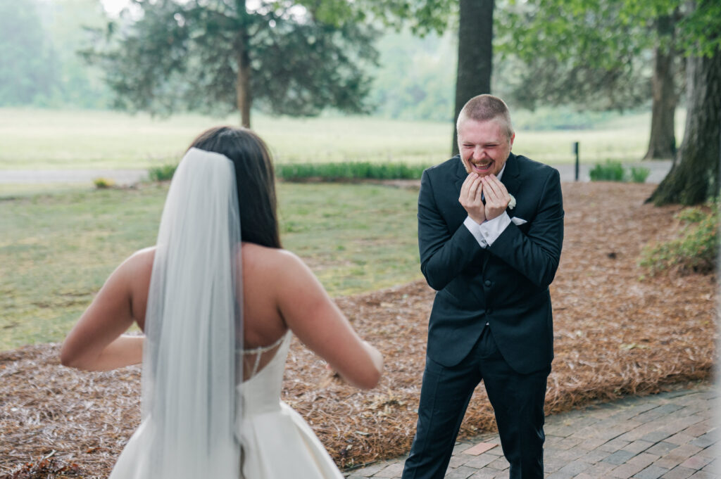 Bride and groom first look emotional