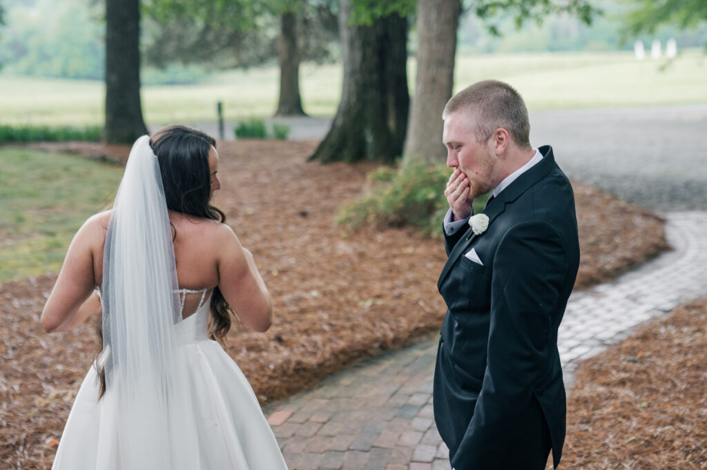 Bride and groom first look emotional
