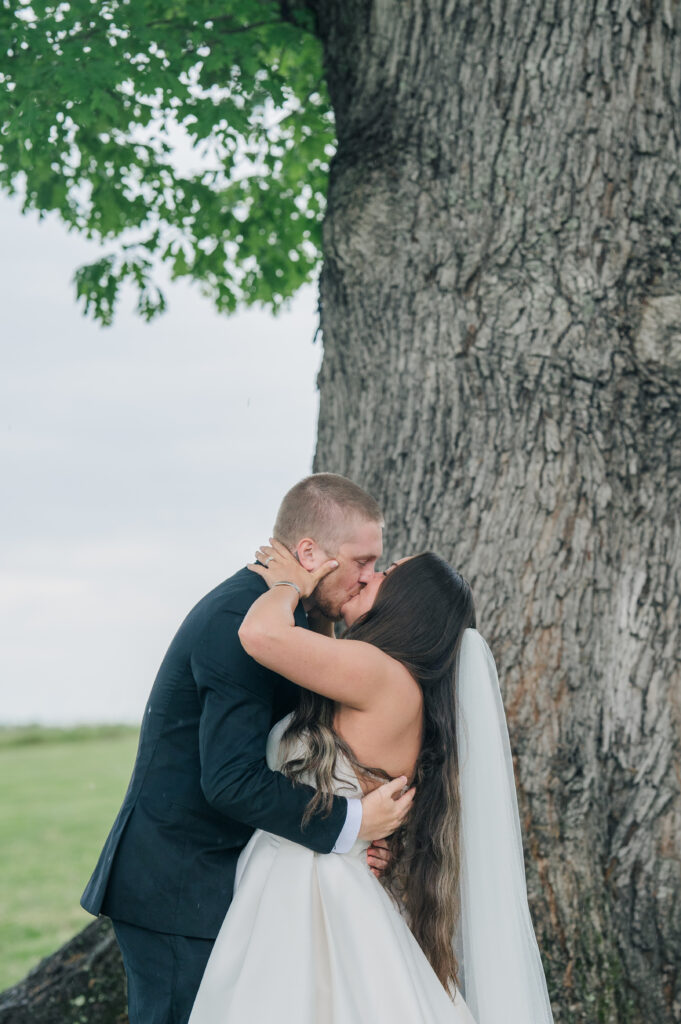 Summerfield farms wedding ceremony first kiss