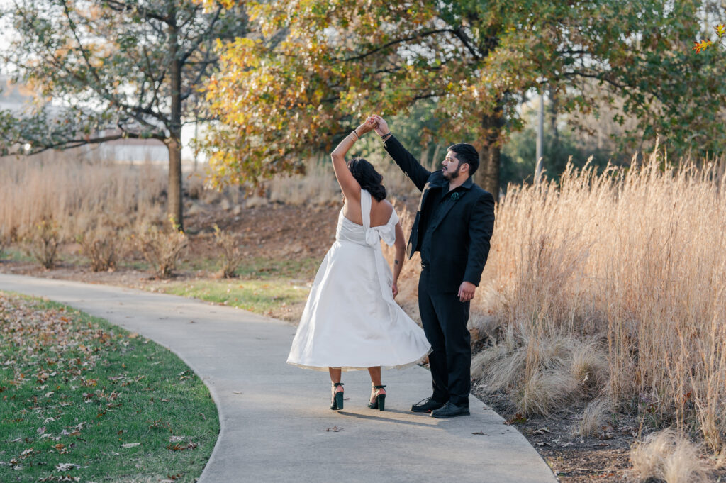 raleigh elopement bride and groom spinning