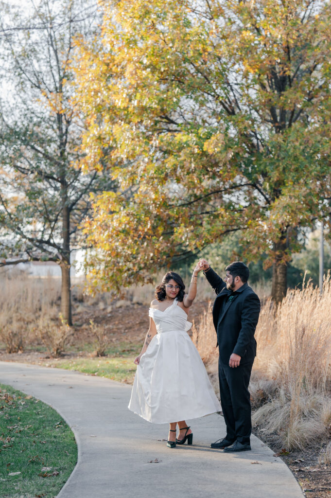 raleigh elopement bride and groom spinning