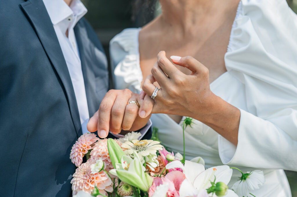 Couple exchanging rings at elopement